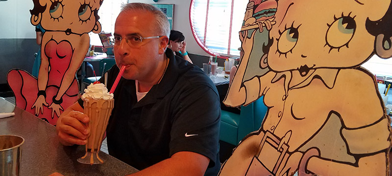 Man with milkshake